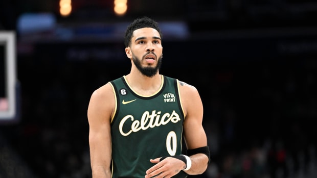 Boston Celtics forward Jayson Tatum looks on during a game.